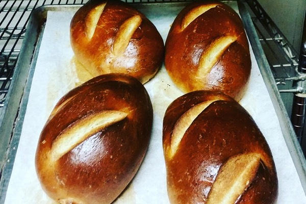 Our bread of the day changes daily, and is baked in house, by Pete, our baker.